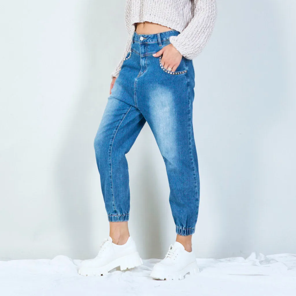 Trendy high-waist jeans with studded pockets wholesale